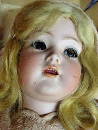 What is the value and history of my inherited antique dolls from Germany?