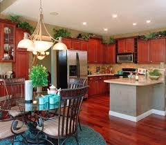 Greenery Above Kitchen Cabinets Ideas With Artificial Leaf Decorations Decolove Above Kitchen Cabinets Decorating Above Kitchen Cabinets Top Kitchen Cabinets