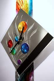 It would be impossible to clone this item exactly as you see it, do to the free hand painting, grinding and crafting process. Modern Metal Wall Art Pendulum Clock Abstract Sculpture Decor Abstract Painting Clock On Metal Original Art Design By Alex Kovacs Ak444 Alex Kovacs Metal Art