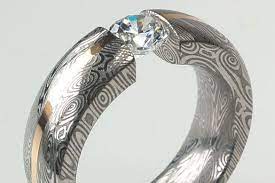 Damascus Steel Tension Set Engagement Ring With Gold Inlay I M Thinking The Inla Tension Set Engagement Rings Future Engagement Rings Wedding Rings Engagement