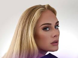 'It's a boy': Adele helps couple announce baby's gender onstage