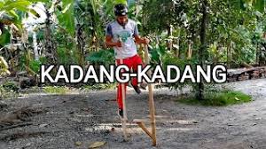 The brown one, they tie a string to it then they would balance themselves onto the shell and walk with it to. Kadang Kadang Karang Traditional Filipino Game Youtube