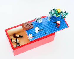 Grace Of Finley And Oliver Came Up With The Perfect Solution A Custom Lego Travel Box She Used A Wooden Box With A Diy Travel Games Lego Boxes Lego Storage