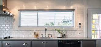 The subway tile is one of my favorite parts of mom's new kitchen! White Subway Tile Around Kitchen Window Port Rexton Beach Style Kitchen Other Metro By Be Kuchen Speisekammerdesign Wandfliesen Kuche Weisse Kuche