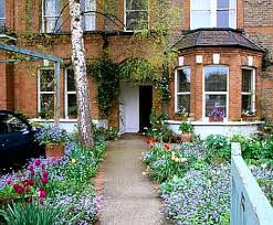 The cool thing about this flower garden is that there is a road that can be used for your vehicle. Terraced House Front Garden Design Ideas The Garden Induced Info