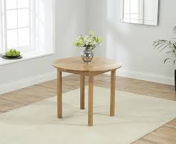 Small solid oak dining table, french grey painted legs. Mark Harris Promo Oak Drop Leaf Round Extending Dining Table Cfs Furniture Uk
