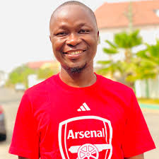 Dr. Clarence K. Moniba added a...