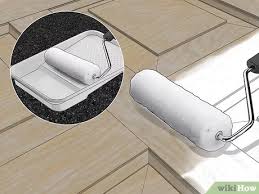 When painting a panel door, a paint brush may be more effective than a roller. How To Paint Oak Doors White With Pictures Wikihow