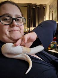 Hi all! I just wanted to introduce myself and share a photo I took. My girl  Skadi likes to crawl up my sleeves