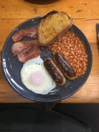 Secondly, pour in the opened cups of canned baked beans, chopped onion, ketchup, honey and mustard into the skillet, oven dish or crockpot. á… Simple Steps On How To Improve Canned Baked Beans