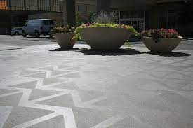 This is a standard concrete finish where the concrete is troweled to a smooth surfaced and then broomed to create a higher traction surface for outdoor. Decorative Concrete Trends In Colorado And Beyond Concrete Decor