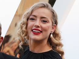 Amber Heard surprises with arrival of twins