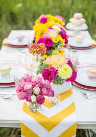 Potted blooms and greenery plus hanging planters with colorful flowers over the table make it bright and boho. 45 Awesome Colorful Wedding Table Settings Weddingomania