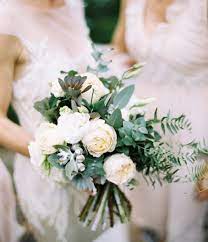 Ruffled whites with touches of blush, mauve, and spring green is fresh and new. Film Photography Stewart Leishman Victoria Australia View Portfolio On The Lane Neutral Wedding Flowers Wedding Flower Inspiration Wedding Flowers