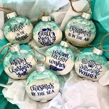 So i put together a collection of favorite beach christmas decorations and ideas, inspired by sea, sand, shells, and simplicity. Where To Find The Best Coastal Christmas Ornaments
