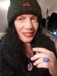 Lost green stone class ring at Ocean Village beach