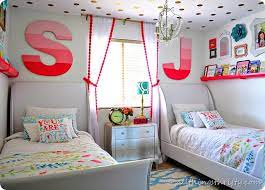 Start with one or two saturated colors like deep magenta and navy blue, then pull it all together with crisp white bordered bedding and accent pieces in a fun chevron print. Coral Gold And Aqua Girl S Bedroom All Things Thrifty