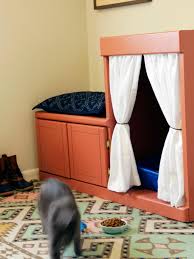 Ductwork inside connects to a standard ceiling fan, which can be flipped on to remove kitty odors. Cabinet Makeover How To Hide A Litter Box Hgtv S Decorating Design Blog Hgtv