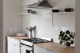 Everything from cabinets, to walls, to flooring. A Minimalist Kitchen Makeover On A Budget The Reveal These Four Walls