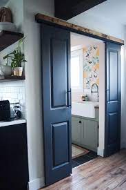 a small bathroom door is the designer trick you ve probably never considered but should hunker in 2021 innenturen innenstallturen schiebeschrankturen