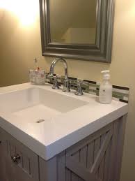 A better alternative to a standard 4 inch tall backsplash is to continue your backsplash all the way up to the ceiling, or the bottom of your upper cabinets, in order to give your kitchen or bathroom a more high end custom look. Small Bathroom Sink Design Ideas Novocom Top