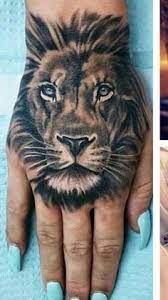 Lion Tattoos Hold Different Meanings Lions Are Known To Be Proud And Courageous Creatures So If Lion Hand Tattoo Lion Tattoo Lion Head Tattoos