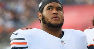 Bears right tackle Larry Borom 'held his own' in first career start
