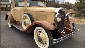 Image result for Scaraba Green 1930 Oldsmobile