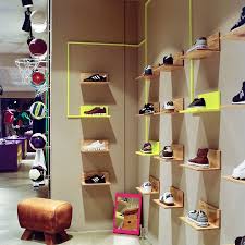 Volution Sports Store By Miks Konzepte Tinnum Retail Design Blog Shoe Store Design Store Interiors Small Store Design