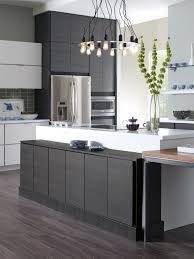 Modern kitchen cabinets feature flat slab doors that avoid excessive details. Contemporary White And Grey Thermofoil Slab Doors Contemporary Kitchen Cabinets Kitchen Cabinet Styles Laminate Kitchen Cabinets