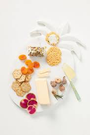 Handcrafted of black marble and acacia wood, our black wood & marble cheese boards offer plenty of space for noshes. Pineapple Marble Cheese Board Anthropologie