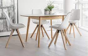 The dansk extendable dining set comes with four elegant designer chairs and a perfectly practical extending table. Dansk Extendable Dining Table 4 Chair Set In White