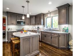 Modern brown white kitchen cabinets dark countertop. Gallery Shiloh Cabinetry