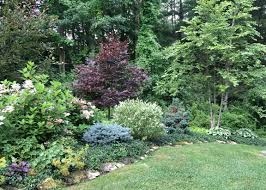 Waves overwhelming the rocky shoreline. Landscaping And Garden Design In The Berkshires Karen Shreefter