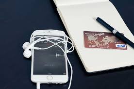 Use saved card to sign on to c i b c online banking. Hd Wallpaper Post 2016 Iphone Beside Visa Card Silver Earpods Credit Mobile Wallpaper Flare