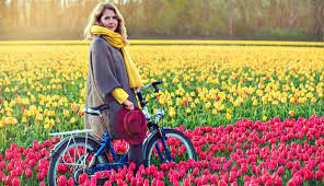 Holland's people are the dutch. What To Wear In The Netherlands Windmills Tulips And Cheese