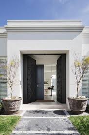 It will add visual volume to a small door. Pin By Rayna Eichhorn On Beautiful Interiors By Design Shuffle Members Exterior Design House Exterior Door Design