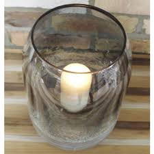 Decorate for the holiday season with these easy and beautiful dollar tree hurricane glass vases turned into gold glam candle holders. Candle Holder Home Accessories Candle Holders Stands