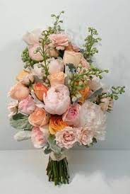 Rustic vine wreath sweetheart table signs. Peach And Coral Wedding Bouquets Dahlia Floral Design Wedding Flowers Bridal Bouquets Bridal Bouquet Peach Barn Wedding Flowers