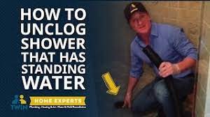 .mixture of storm drain water and sewage water started to come up through the pipes and escape our laundry drain and promptly flood the whole first floor with storm/shit from your house) so this shower has the smallest u pipe in your house most likely and the water sitting in it is being pushed back up. How To Unclog A Shower With Standing Water Fast Easy Youtube