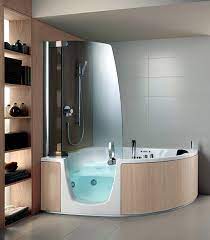 The floor and wall can be from marble with a glass door. Ergonomic Corner Bathtub With Whirlpool Function By Teuco Interior Design Ideas Ofdesign