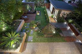 Graced by mature trees and shrubs, keaveny added colorful ornamentals like cordyline, heather, and mini nepeta. These Delightful Set Of Designs Come From The Stables Of Australian Firm Rolling Stone Landscapes W Modern Landscaping Modern Landscape Design Landscape Design