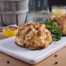 Carefully turn the crab cakes over and transfer the pan to the oven. Four Colossal Lump Maryland Crab Cakes 8oz Jimmys Famous Seafood