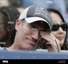 Andrew Murray's coach Brad Gilbert watches his young prodigy in action  against Nikolay Davydenko during their 4th round match during the US Open  in Flushing Meadow, New York Stock Photo