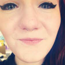 If I Were To Ever Pull Off A Septum Piercing I D Do It Like This Where You Can Barely See The Ring Just The Lit Piercing Nose Piercing Body Piercing Jewelry
