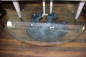 The coffee table is the piece of resistance in the living room. Coffee Table W Ceramic Bear Base Thick Glass Top