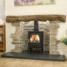 Country Style Stove Fireplaces From Britain S Heritage Countrystove Stoves Woodburners Lo Stone Fireplace Surround Cottage Fireplace Freestanding Fireplace