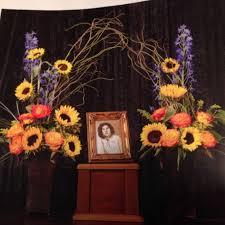 While the responsibility for choosing the funeral flowers (such as a casket spray or urn arrangement) is left to the immediate family, those surrounding the family can send a comforting. Urn Arrangement For A Memorial Service Funeral Floral Funeral Floral Arrangements Urn Arrangements