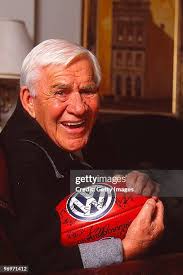 Former Geelong AFl player Doug Wade poses with a jersy and football... News  Photo