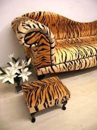 This bedroom chaise lounge is finished in dark hardwood. Tiger Print Chaise Lounge Tiger Animal Print Chaise Lounge Double Ended Sofa Animal Print Animal Print Furniture Animal Print Decor Printed Chair